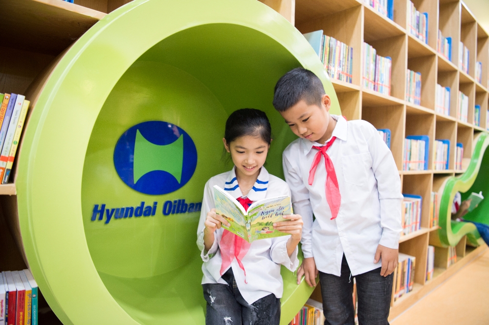 베트남 어린이들이 도서관에서 책을 읽고 있다.(사진=현대오일뱅크)