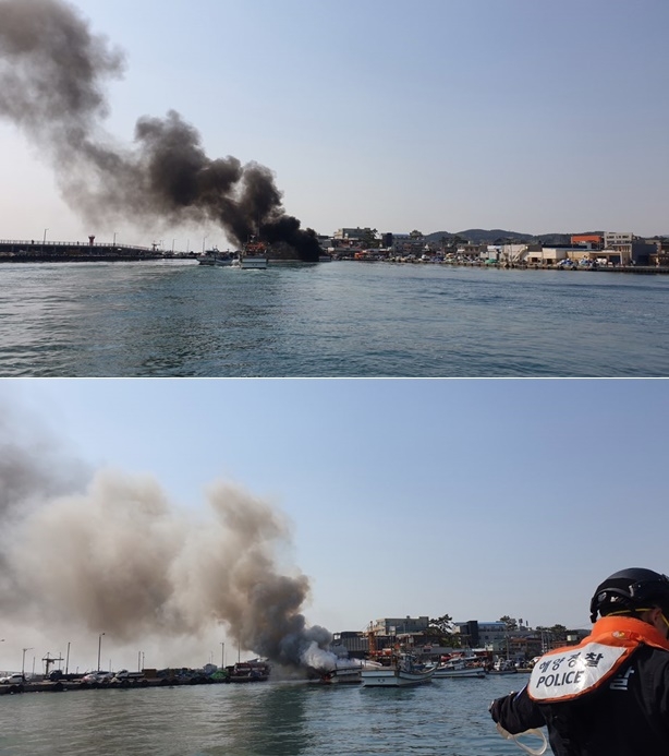 9일 오전 임랑해수욕장 앞 해상 선박화재를 진화하고 있다.(사진제공=울산해양경찰서)