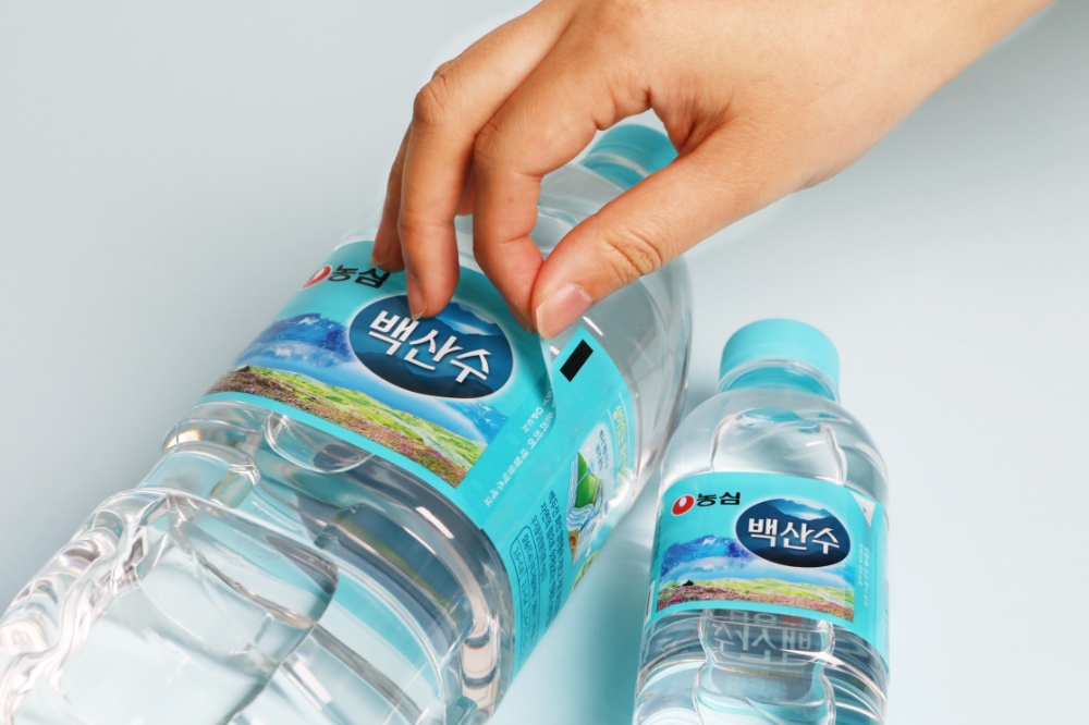 농심, 백산수 ‘ 이지오픈’ 라벨 적용