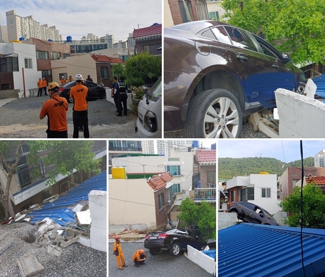 26일 부산 동래구 한 교회주차장 담벼락을 뚫고 빈집 옥상위로 돌진. (사진제공=부산경찰청)