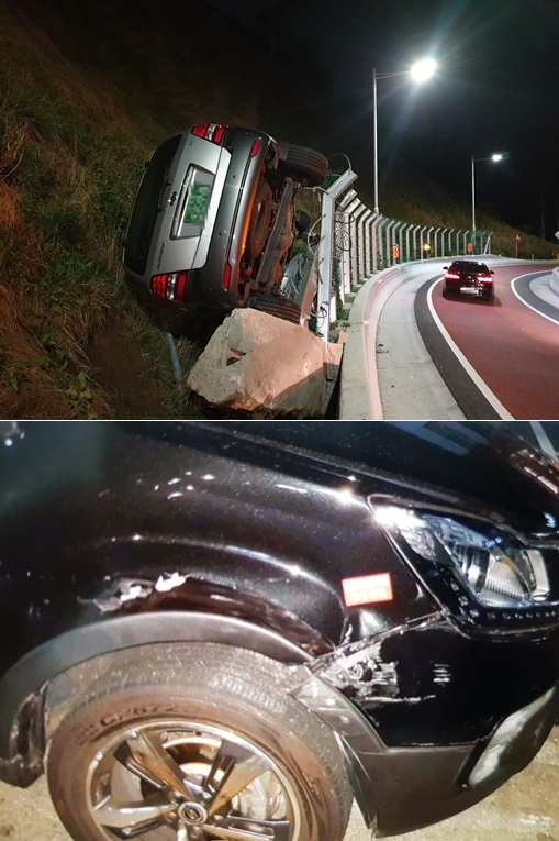 5일 오후 9시 20분경 금정구 윤산터널 전 합류지점에서 코란도차량이 쏘렌토 차량을 충격해 쏘렌토차량이 전도된 사고현장.(사진제공=부산경찰청)