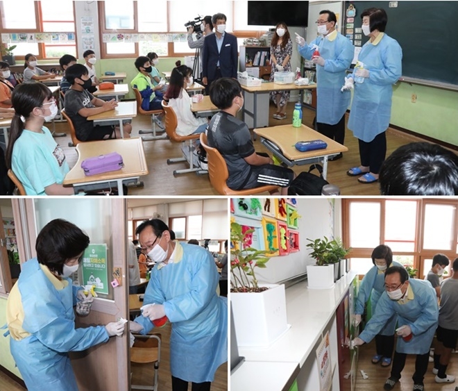 방역소독을 하고 있는 노옥희 교육감과 송철호 울산시장.(사진제공=울산시)