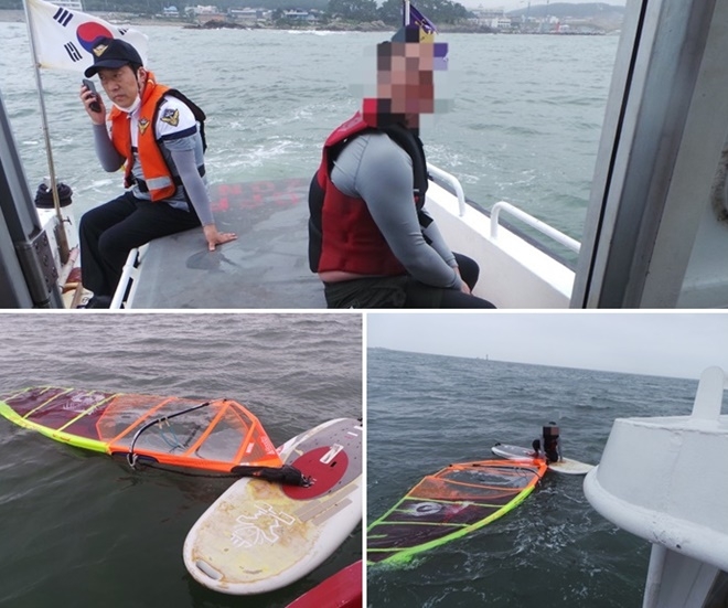 25일 오전 체력고갈 표류 윈드서핑객을 구조.(사진제공=부산해양경찰서)