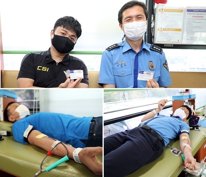 헌혈에 동참하고 헌혈증서를 내보이고 있다.(사진제공=남해지방해양경찰청)