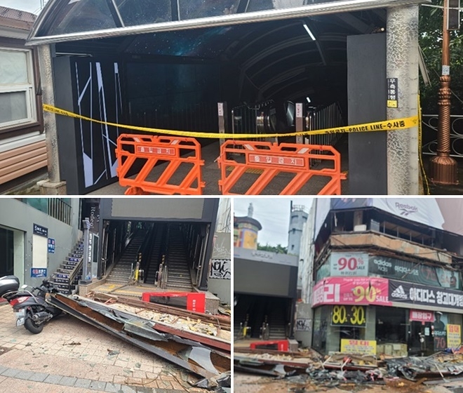 2일 오전 10시 35분경 부산 중구 용두산공원 에스컬레이트 입구 3층 건물외벽 파손 낙하.(사진제공=부산경찰청)