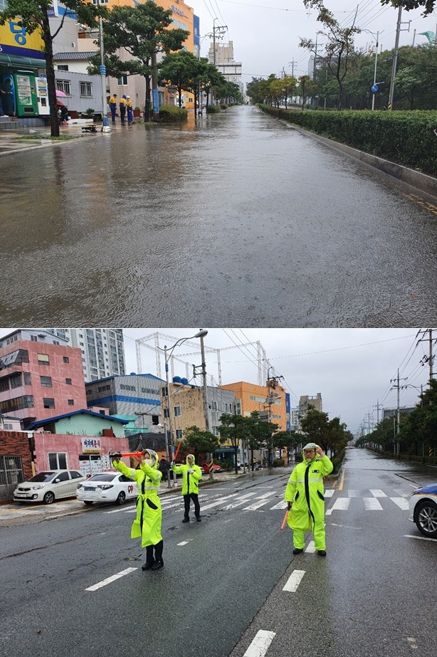 영도 청학동 동굴식당 앞 300m구간, 바닷물역류로왕복4개차로 전면통제.(사진제공=부산경찰청)