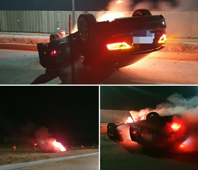 12월 1일 오후 10시 46분경 강서경찰서 강동동방향에서 아우디차량이 전복돼 화재.(사진제공=부산경찰청)