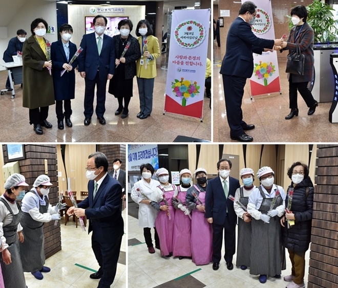 김석준 교육감이 8일 장미꽃을 전달하며 격려하고 있다. (사진제공=부산시교육청)