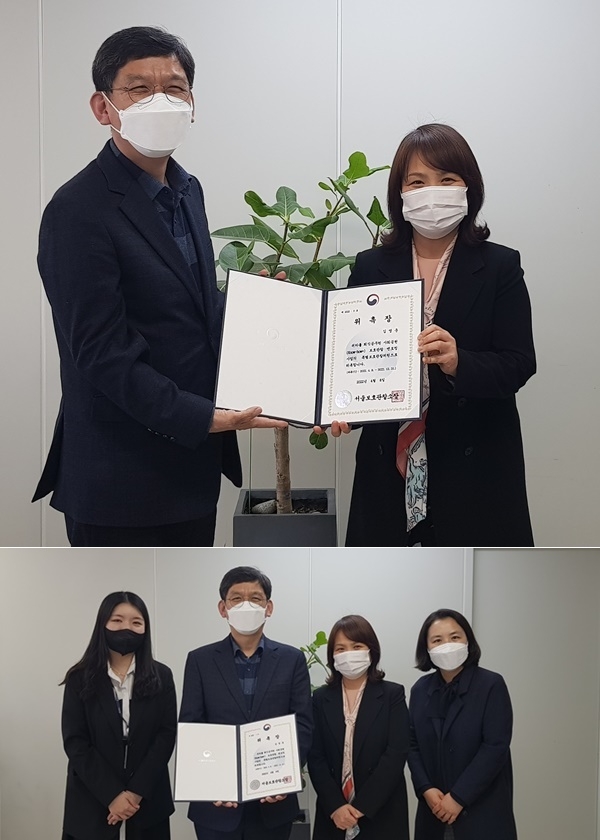 황진규 소장이 특별보호관찰위원 위촉장을 전달하고 기념촬영.(사진제공=서울준법지원센터)