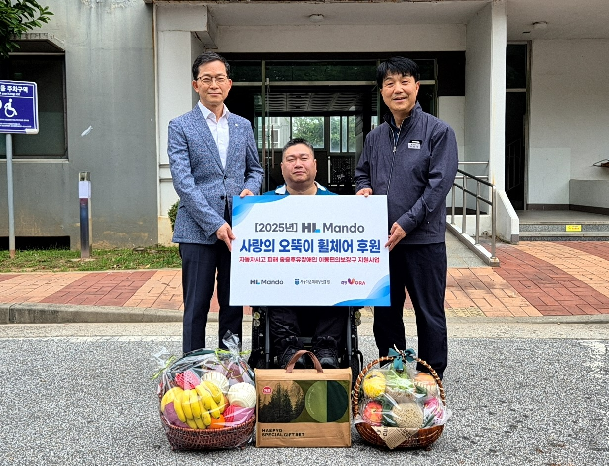 (왼쪽부터0 자동차손해배상진흥원 신세계 본부장, HL만도 신성호 상무.(사진=HL그룹)